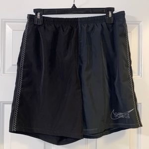 Men’s Nike, running shorts, size medium, worn twice, split color black and gray.